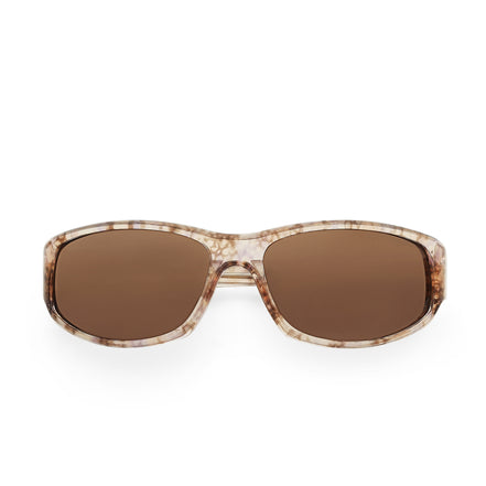 Sunglasses with tortoiseshell frame and brown lenses on a white background